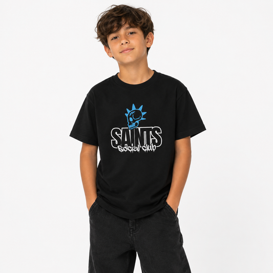 Child wearing a black t-shirt with 'Saints Social Club' logo on a white background