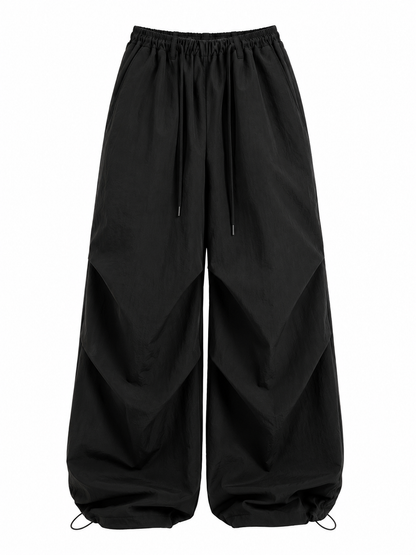 Black wide-leg pants on a white background